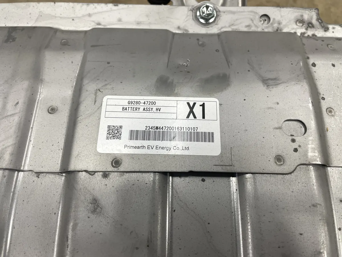 Close-up photo of an EV battery pack barcode label