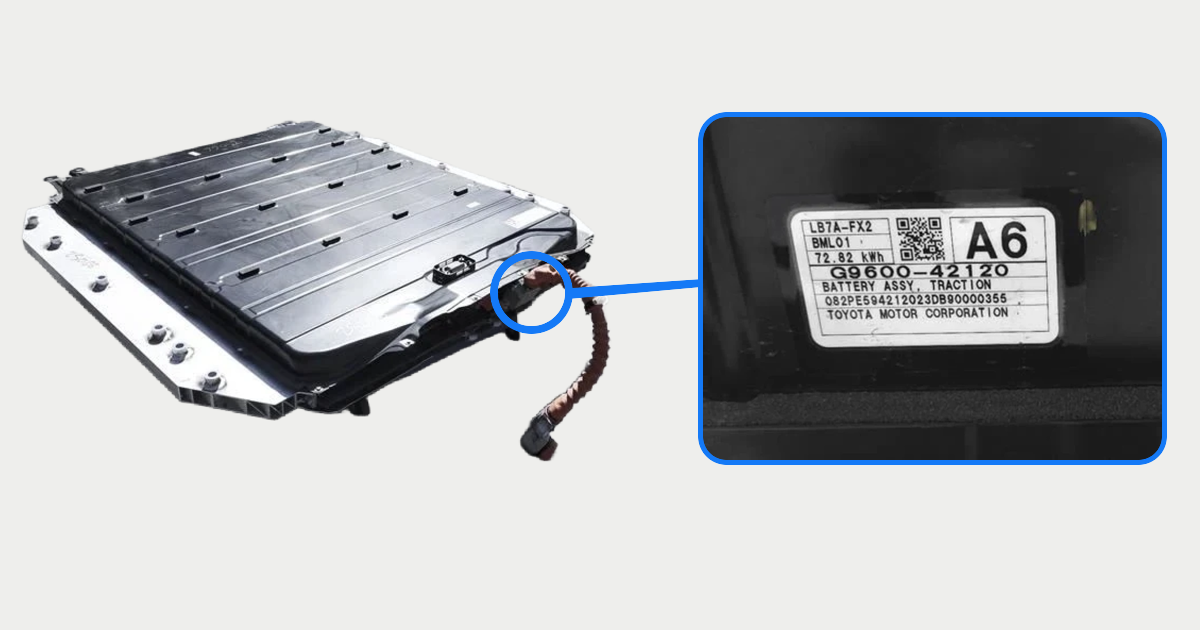 Real Subaru Solterra EV battery pack beside an enlarged view of its G9600-42120 traction-battery assembly label
