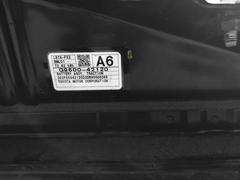 Close view of the Solterra battery assembly label with Toyota part number G9600-42120 and 72.82 kWh marking